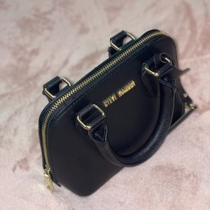 Steve Madden hand bag.